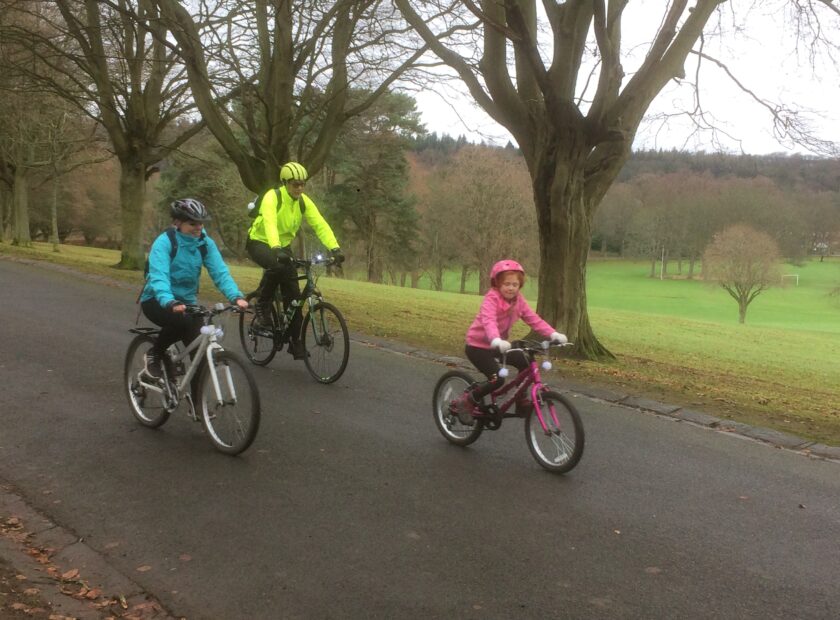 Family riding bikes