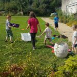 community climate action - kids playing on the grass