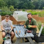 FRIENDS: Adam (left) with his 'boss' Euan