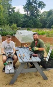 FRIENDS: Adam (left) with his 'boss' Euan