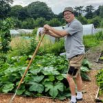 DIGGING IN: Ralph puts in some good work on the raised vegetable beds.