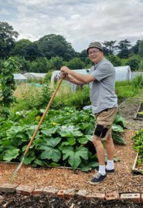 DIGGING IN: Ralph puts in some good work on the raised vegetable beds.