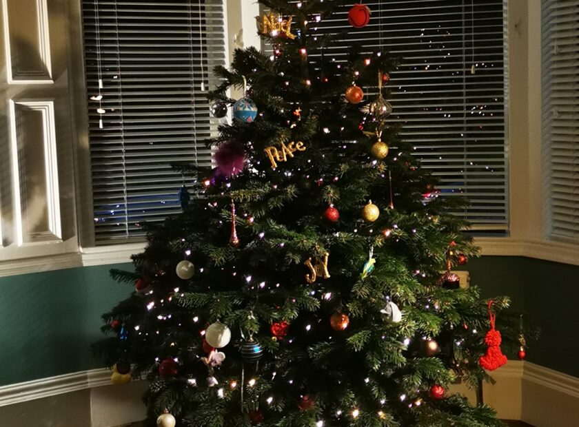 Our 2020 tree, locally sourced and decorated with hand-me-down decorations.